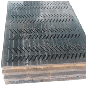 Stack of steel plates with rows of angled slots